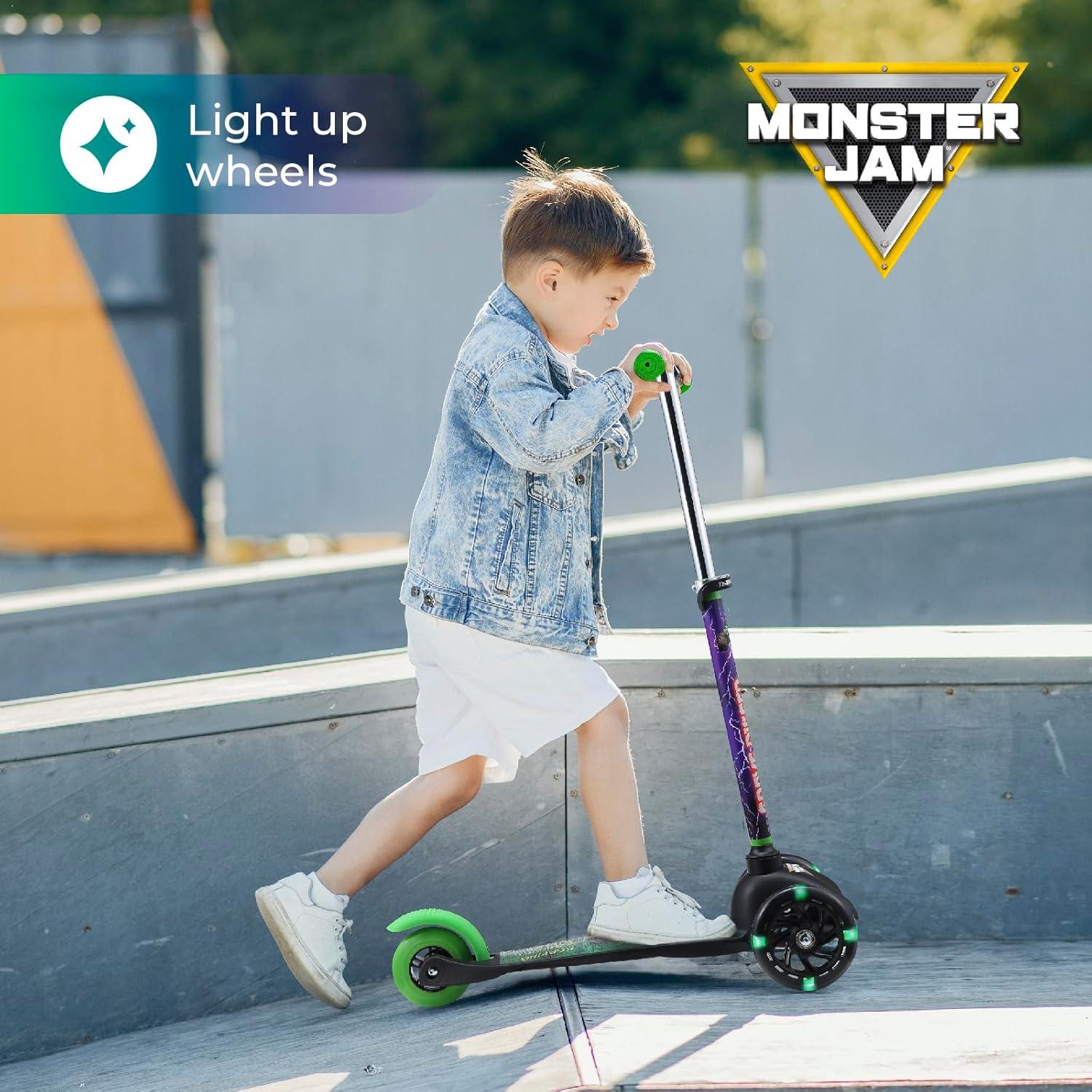 imageSelf Balancing Kick Scooter with Light Up Wheels Extra Wide Deck 3 Wheel Platform Foot Activated Brake 75 lbs Limit Kids amp Toddlers Girls or Boys for Ages 3 and UpMonster Jam