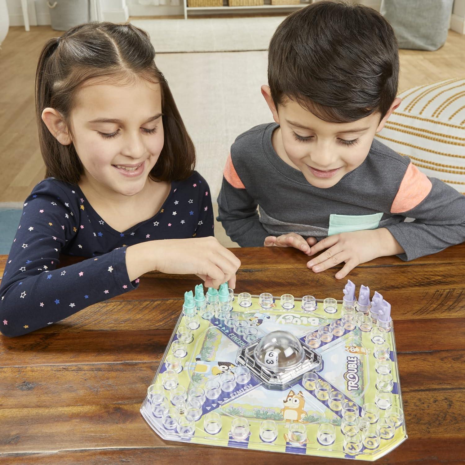 imageHasbro Gaming Trouble Bluey Edition Board Game for Kids 24 Players Race Bluey Bingo Bandit or Chilli to The Finish Ages 5 and Up Amazon Exclusive1 unit