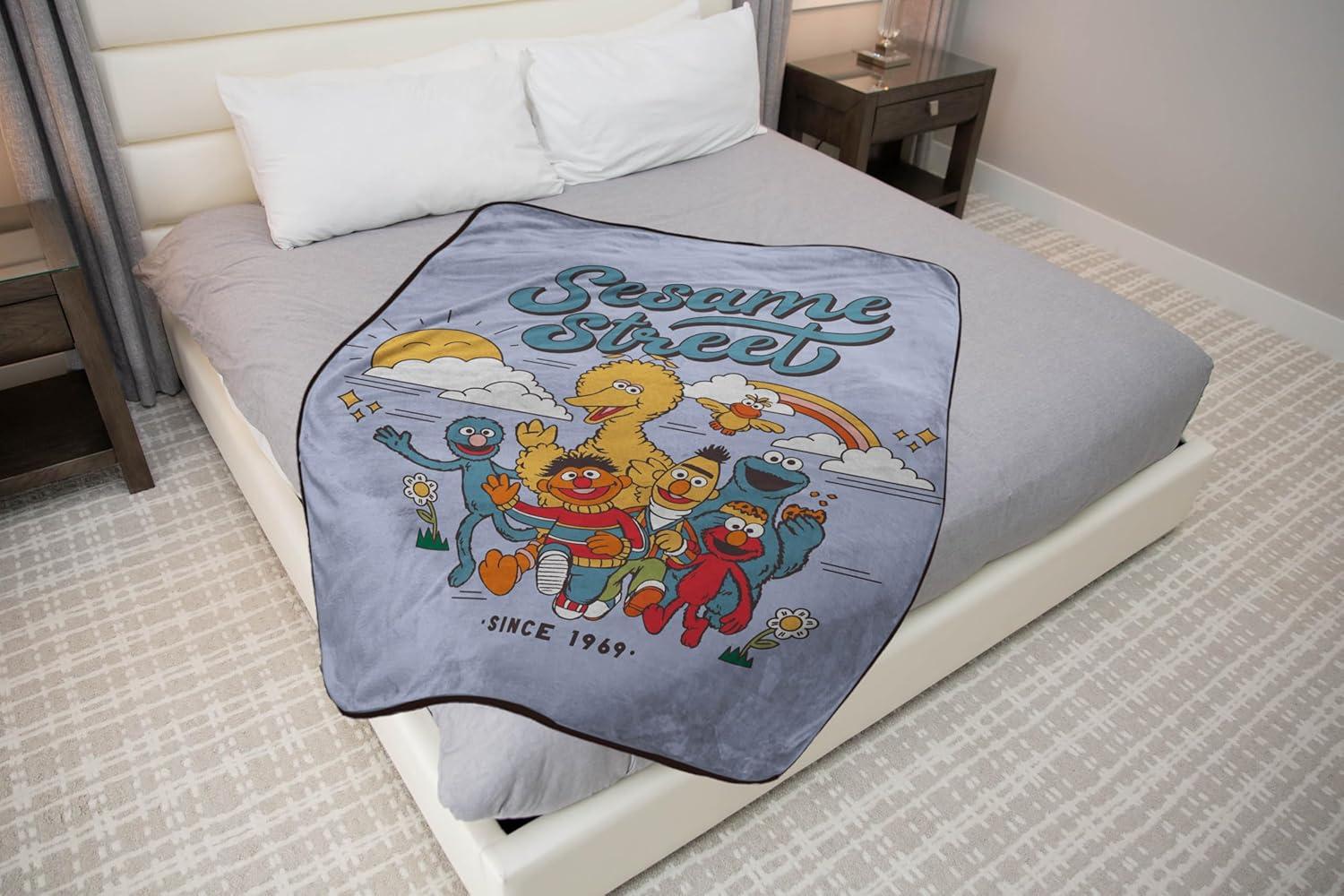 imageJay Franco Kids Plush Throw Blanket Soft amp Comfy Throw for Couch or Bed Cozy Home Dcor for Living Room amp Bedroom Multi Bluey 46x60 Throw BlanketPurple Sesame Street