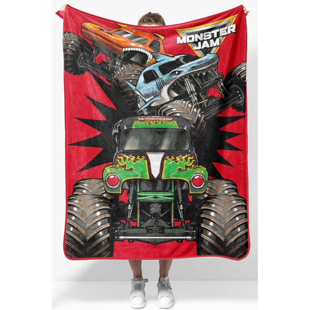imageJay Franco Kids Plush Throw Blanket  Soft amp Comfy Throw for Couch or Bed  Cozy Home Dcor for Living Room amp Bedroom Blue  Bluey 40x50  Travel BlanketRed  Monster Jam