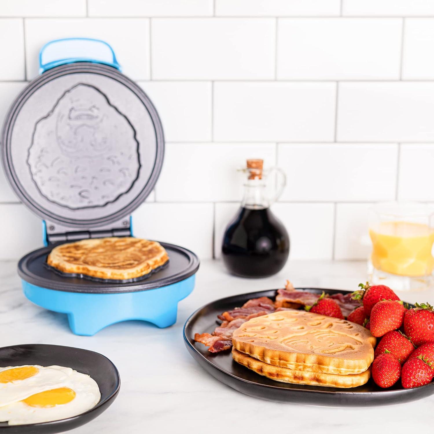 imageUncanny Brands Bluey Waffle Maker NonStick Round Waffle Iron Easy to Use and CleanBob Ross