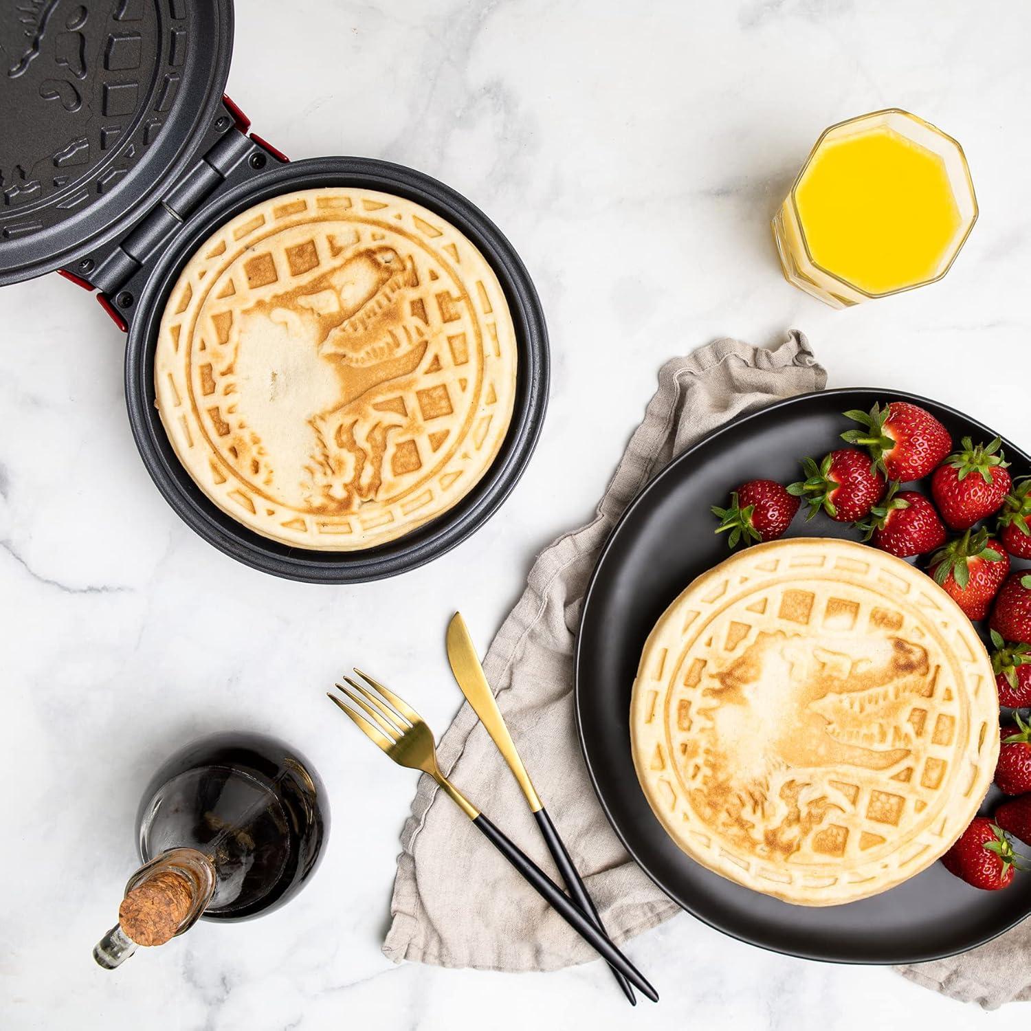 imageUncanny Brands Bluey Waffle Maker NonStick Round Waffle Iron Easy to Use and CleanJurassic Park