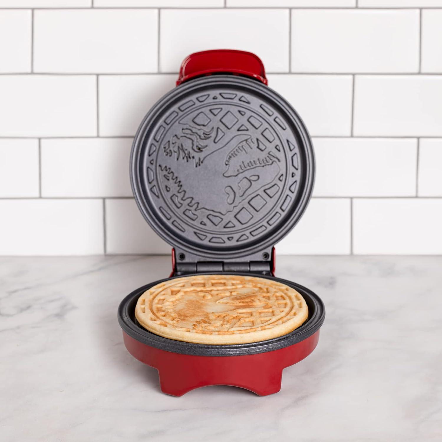 imageUncanny Brands Bluey Waffle Maker NonStick Round Waffle Iron Easy to Use and CleanJurassic Park