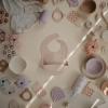 mushie x Bluey Silicone Baby Bib | Adjustable Fit Waterproof Bibs (Bluey Ivory)(Daisy)