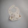 mushie x Bluey Silicone Baby Bib | Adjustable Fit Waterproof Bibs (Bluey Ivory)(Pink Flowers)