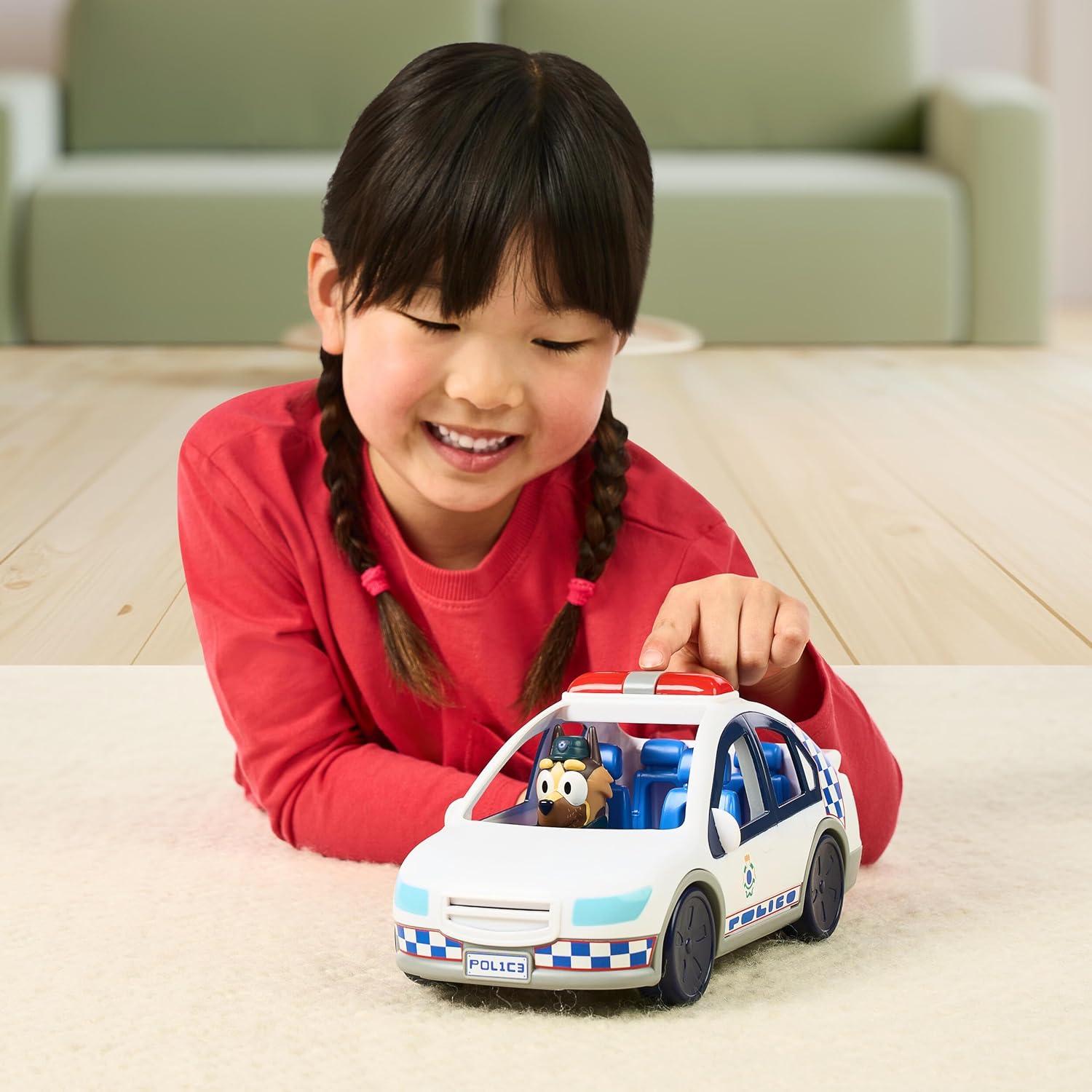 imageBluey Police Car Toy Vehicle from The Special Episode The Sign Includes Toy Police Car with Flashing Lights amp Sounds Policeman Figure and Themed Sticker Set Batteries Included