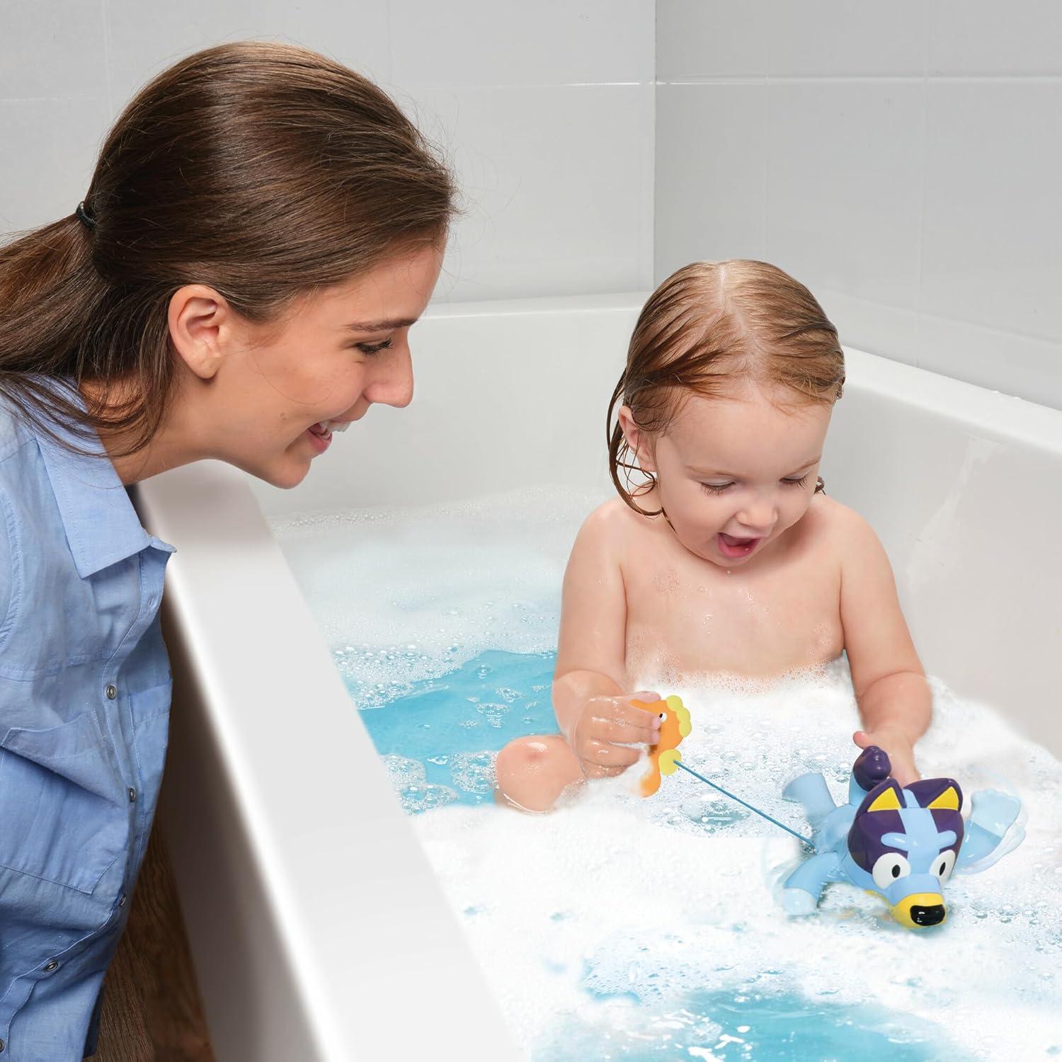 imageTOMY Toomies Bluey Pull and Go Canoe Pull String Helps Bluey Paddle Through Water Includes Bingo Bath Toy Pourer Bluey Toys for Bath Ages 18 Months and UpSwimming Bluey