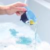 TOMY Toomies Bluey Pull and Go Canoe – Pull String Helps Bluey Paddle Through Water – Includes Bingo Bath Toy Pourer – Bluey Toys for Bath – Ages 18 Months and Up(Family Pourers)