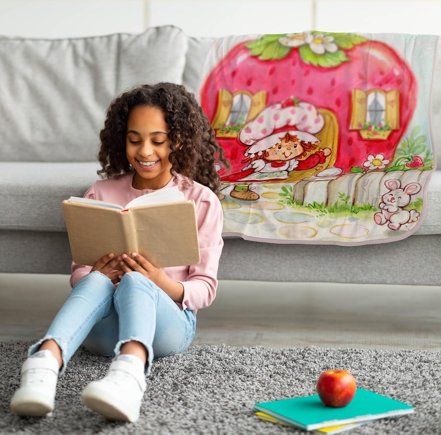 imageJay Franco Kids Plush Throw Blanket Soft amp Comfy Throw for Couch or Bed Cozy Home Dcor for Living Room amp Bedroom Pink Bluey 40x50 Travel BlanketMulti Strawberry Shortcake