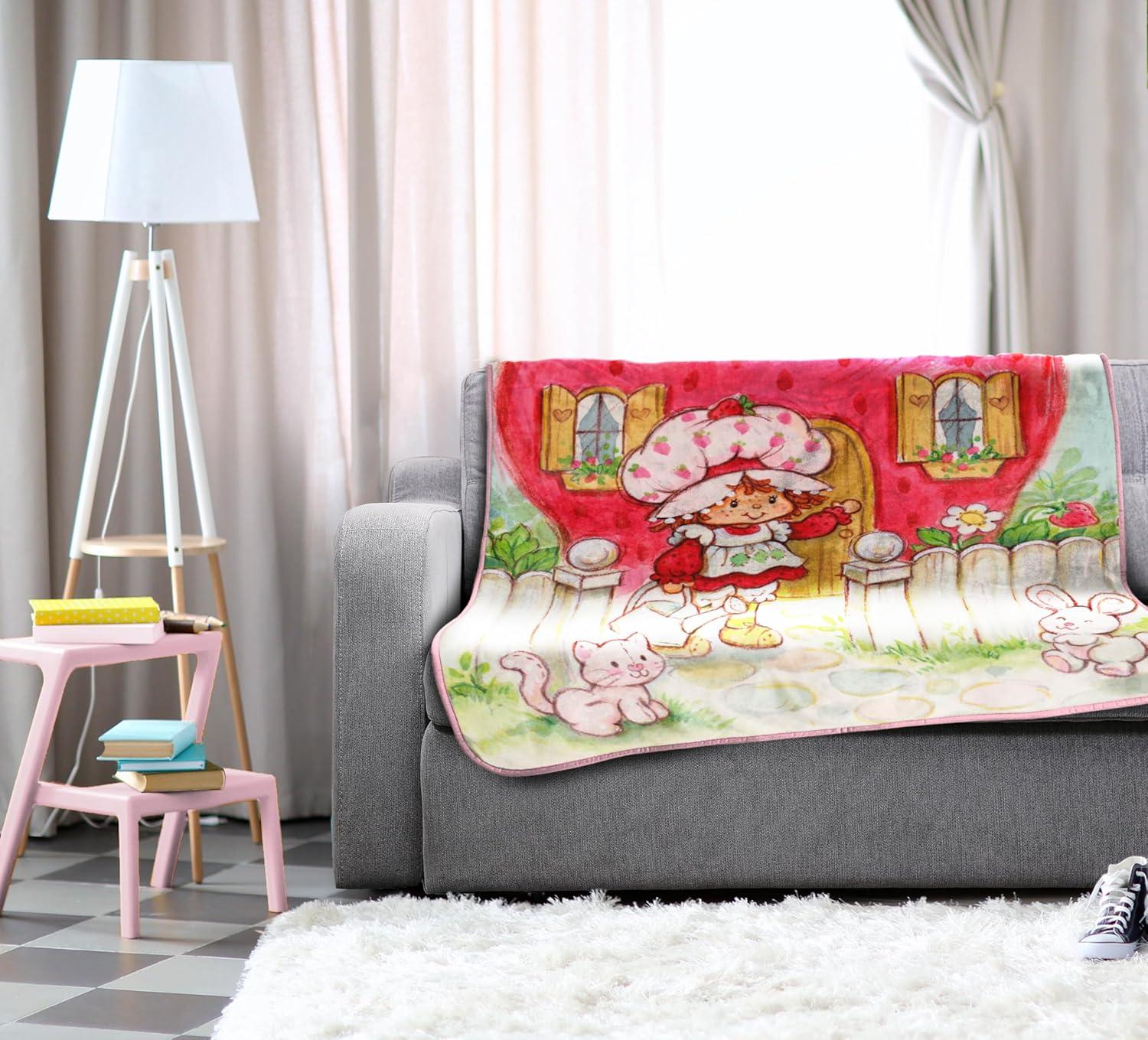 imageJay Franco Kids Plush Throw Blanket Soft amp Comfy Throw for Couch or Bed Cozy Home Dcor for Living Room amp Bedroom Pink Bluey 40x50 Travel BlanketMulti Strawberry Shortcake