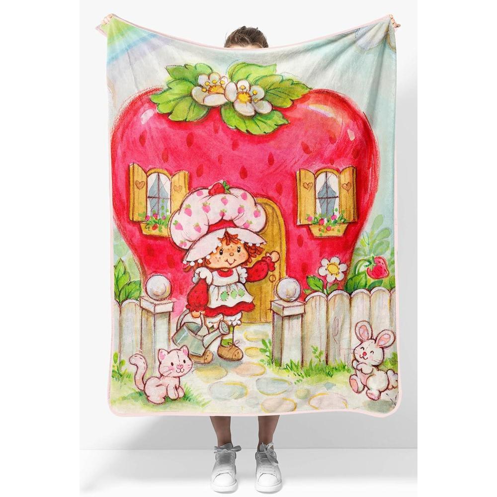 imageJay Franco Kids Plush Throw Blanket  Soft amp Comfy Throw for Couch or Bed  Cozy Home Dcor for Living Room amp Bedroom Pink  Bluey 40x50  Travel BlanketMulti  Strawberry Shortcake