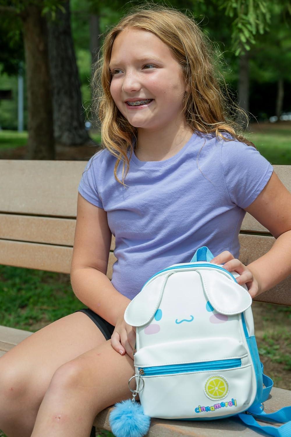 imageAI ACCESSORY INNOVATIONS Bluey 9 Micro Mini Backpack Purse Featuring a 3D Bluey Glitter Patch with Pom Pom Dangle BlueCinnamoroll