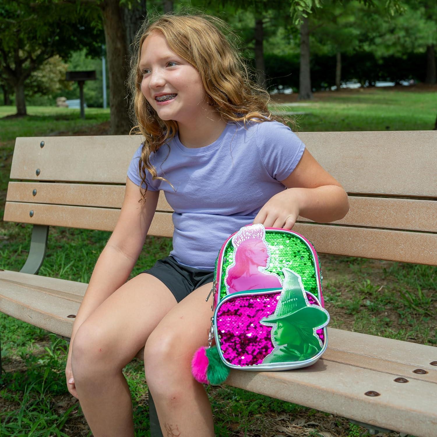 imageAI ACCESSORY INNOVATIONS Bluey 9 Micro Mini Backpack Purse Featuring a 3D Bluey Glitter Patch with Pom Pom Dangle BlueWicked
